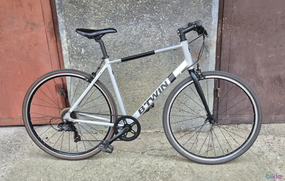 Pre? redus Citybike Btwin Triban 100 pe 28